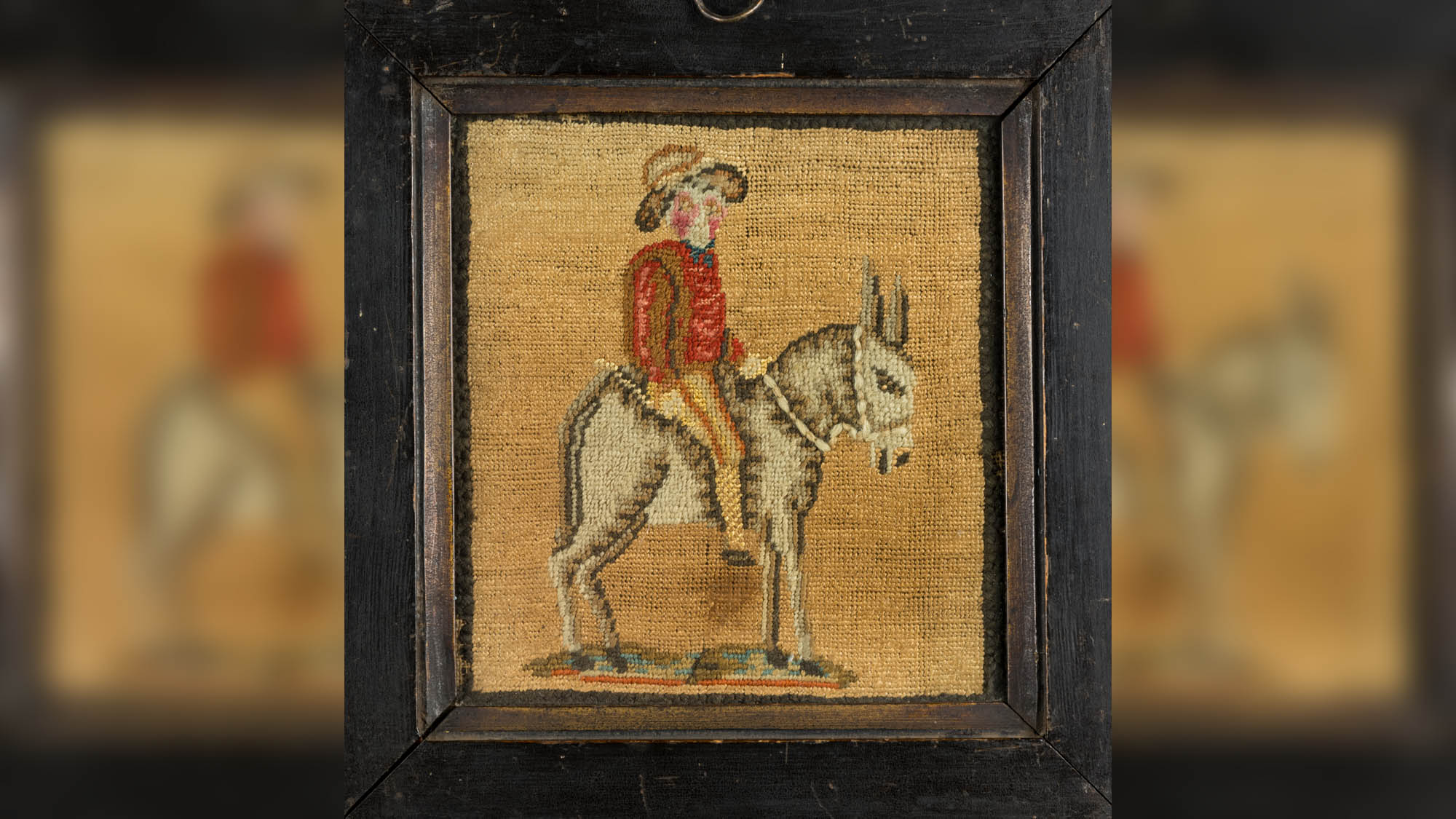 photo of a needlework sampler