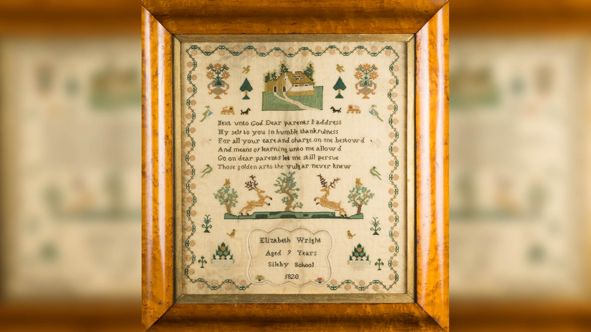 photo of a needlework sampler