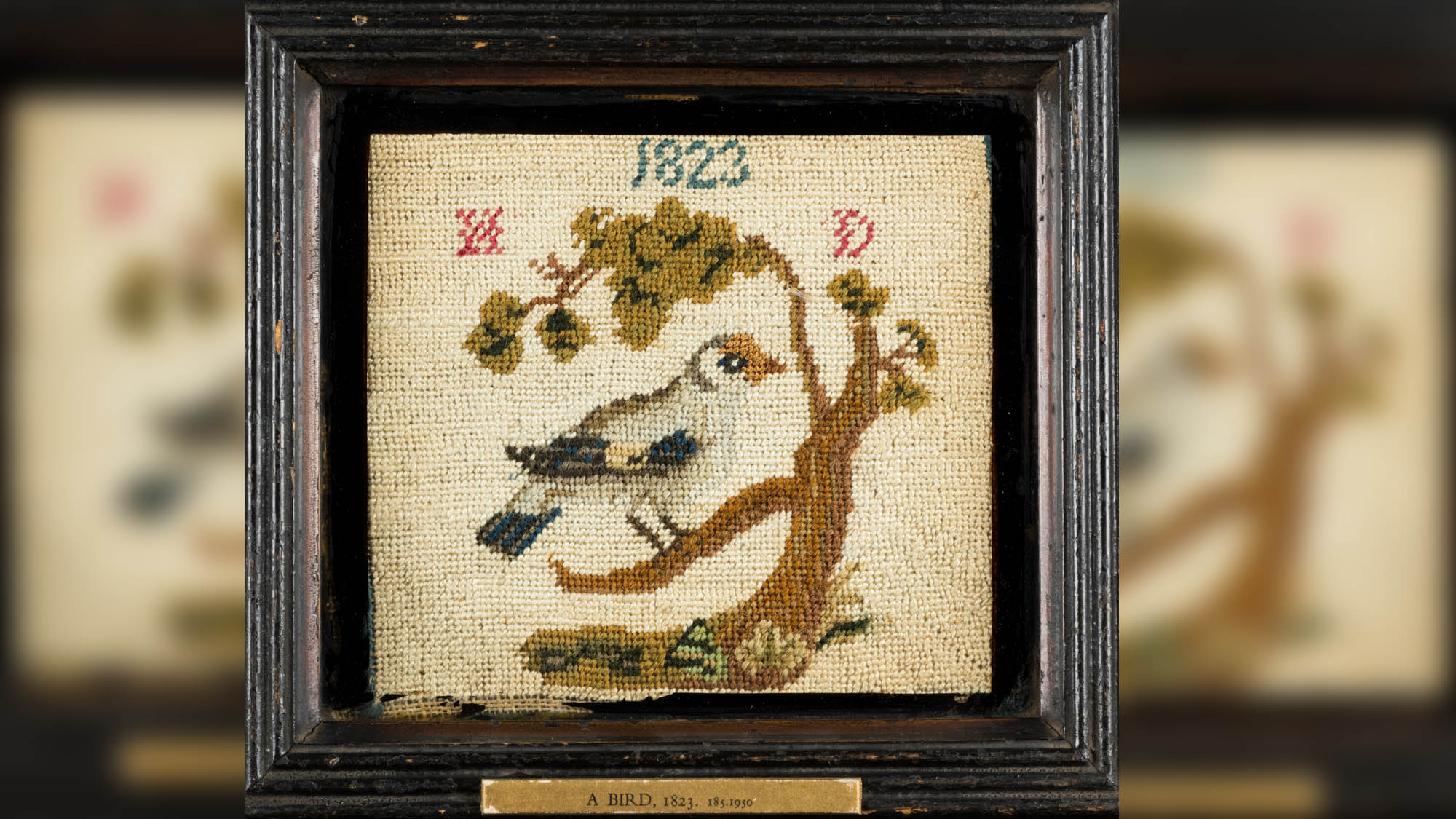 photo of a needlework sampler
